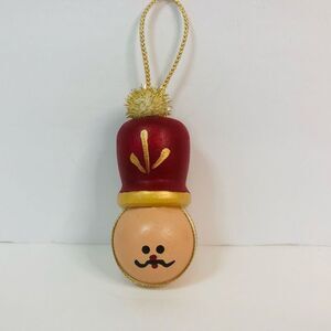 handmade soldier head ornament 1996 red and gold wooden vintage christmas
